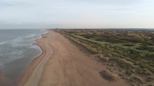 Aerial View Of Long Sandy Beach In The North Sea, South Holland, Netherlands Near Katwijk. Drone alt