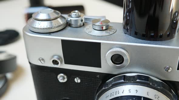 Retro Photo Camera with Photographic Film and Lens