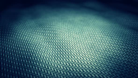 Endless closeup animation of the teal fabric focused in the middle. Loopable. HD alt