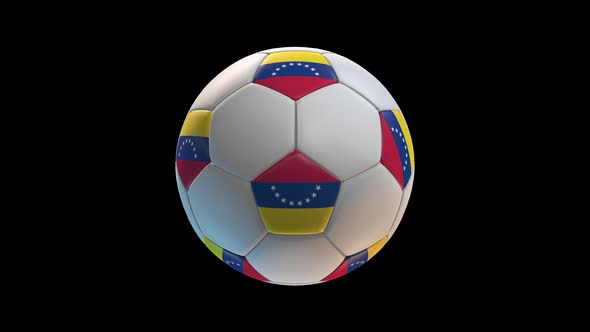 Soccer ball with flag Venezuela, on black background loop alpha