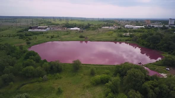 Aerial View of Artificial Lake with Pink Water, Pollution By Toxic Chemicals