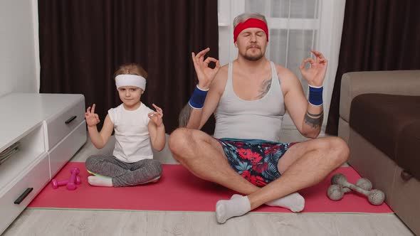 Retro Style Father and Cute Little Kid Daughter Meditating in Lotus Pose at Home Yoga Exercises alt