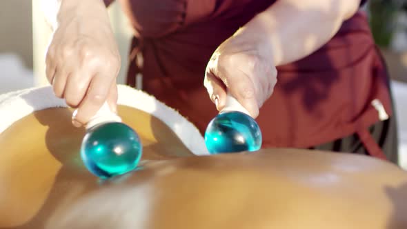 Back Massage Using Special Tools alt