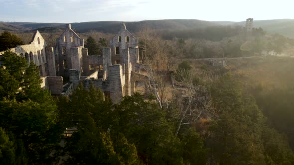 Beautiful Serene Scene of Ancient Castle Ruins with Morning Sun Rays, Aerial alt