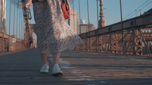 Attractive girl with a camera alt