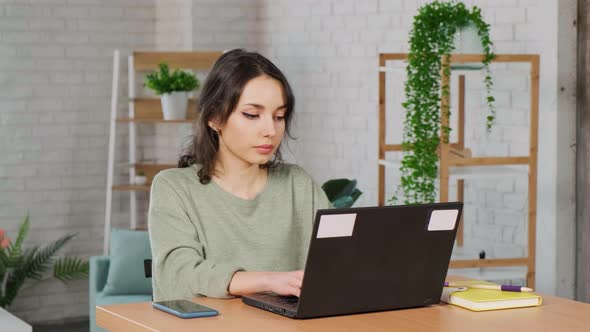 Stressed Woman Feeling Tired Worried About Work Problem Looking at Laptop Screen alt