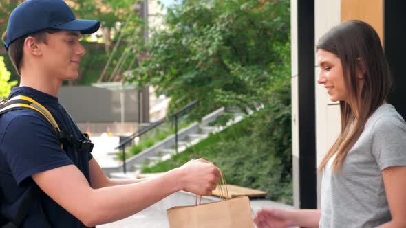 Smiling Food Delivery Man Courier with Thermal Backpack Deliver Order Woman alt