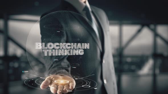 Blockchain Thinking with Hologram Businessman Concept alt