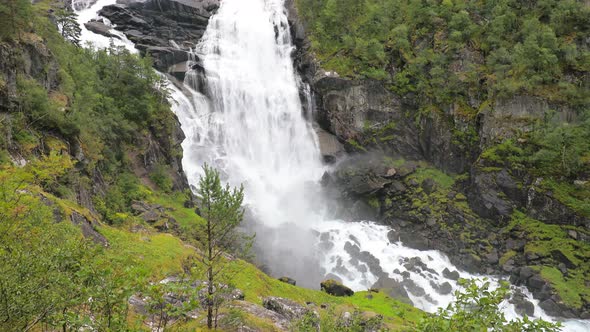 Nyastolfossen falls, waterfall in Husedalen valley, Kinsarvik, Norway alt