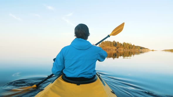 Outdoor Activities During Quarantine, Man Paddles Kayak Alone, Self-isolation alt