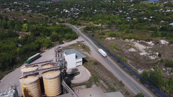 Aerial view of a flour mill with storage bins.