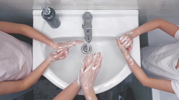 People Wash Their Hands in the Bathroom To Protect Against Coronavirus