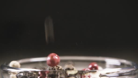 Slow Motion Pepper Mixture Pour Peas Into a Bowl Close-up
