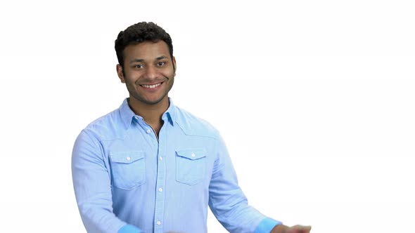 Young Man Showing to Copy Space with Hands alt