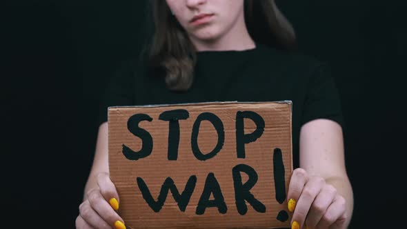 Upset Ukrainian Poor Girl Protesting Against the Military Conflict alt