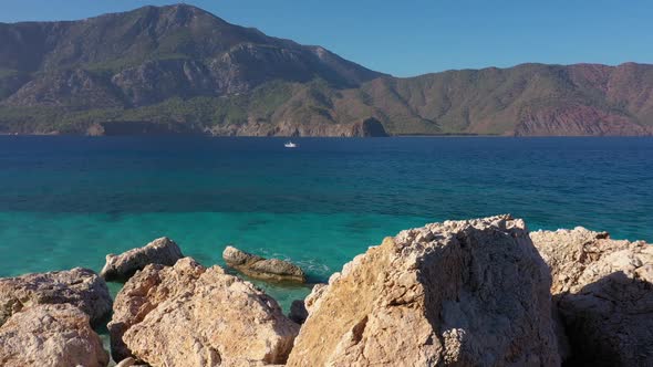Cruise Ship Sailing on Sea Bay with Mountains in the Background alt