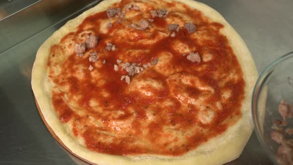 Pizzaiolo Making Pizza