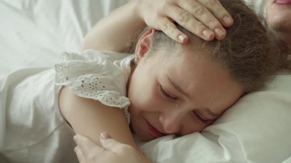 Portrait Cute Upset Child Little Girl with Big Tears Flowing Down His Cheekschild Lies at Home on alt