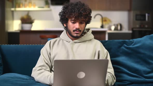 Disappointed Curly Indian Freelancer Guy Made Mistake in Project