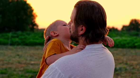 Father and Son at Sunset alt