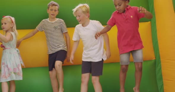 Children in bouncy castle