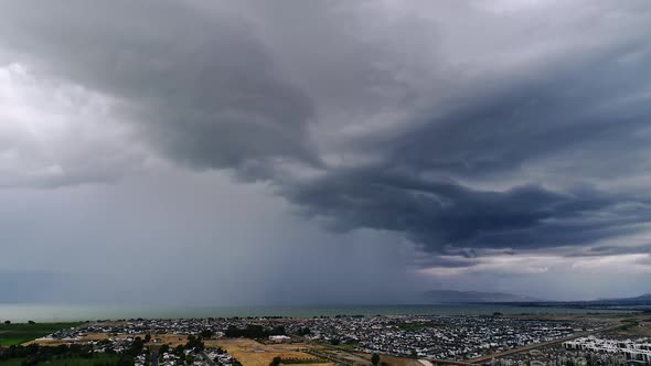 Hyperlapse of dramatic summer rain storm moving over Utah Lake alt