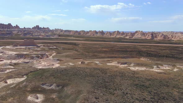 Fly over grassland in Badlands National Park, South Dakota alt