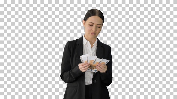 Brunette woman counting euro banknotes, Alpha Channel alt