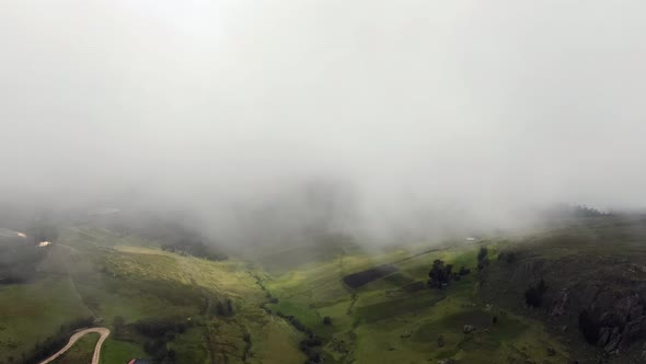 Thick Clouds Covering Green Andean Landscape In Cumbemayo, Cajamarca, Peru. Aerial Drone alt