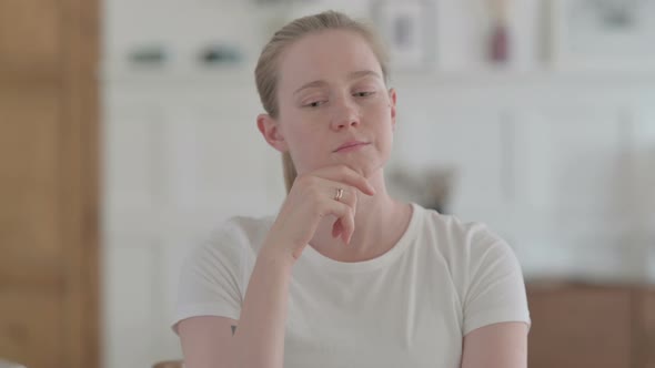 Pensive Beautiful Young Woman Thinking and Having New Idea alt