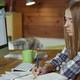 Female Student Doing Homework - VideoHive Item for Sale