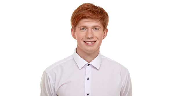 Young Confident Caucasian Redhead Man Calmly Standing on White Background Smiling and Showing Ok in alt