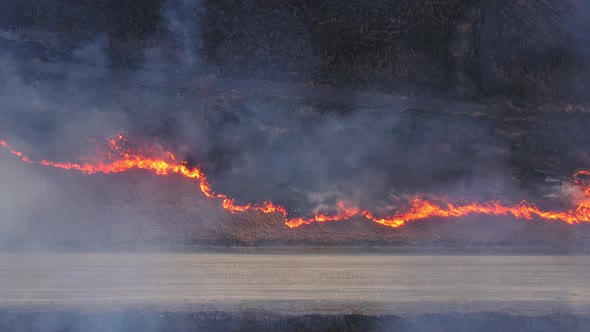 Aerial View of a Burning Dry Field alt