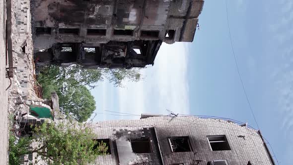 Vertical Video of a Destroyed Residential Building During the War in Ukraine alt