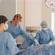 Surgeons Team Performing Operation in Hospital Operating Theater Male Surgeon - VideoHive Item for Sale