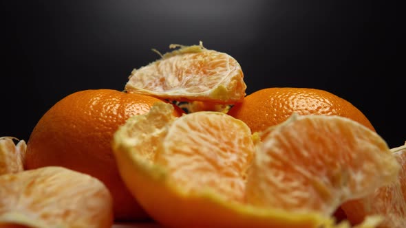 Juicy Mandarin Slices Close Up in Rotation