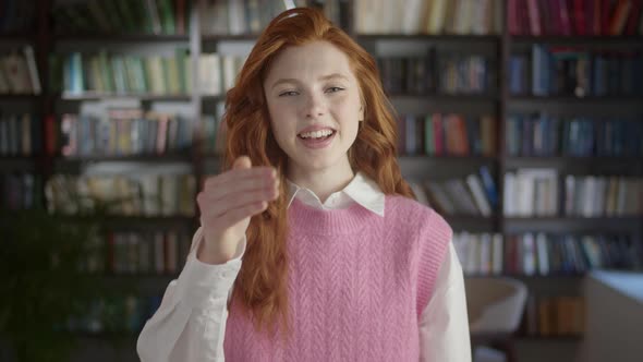 Smiling Confident Young Professional Business Woman Hr Employer Looking at Camera Extending Hand for alt