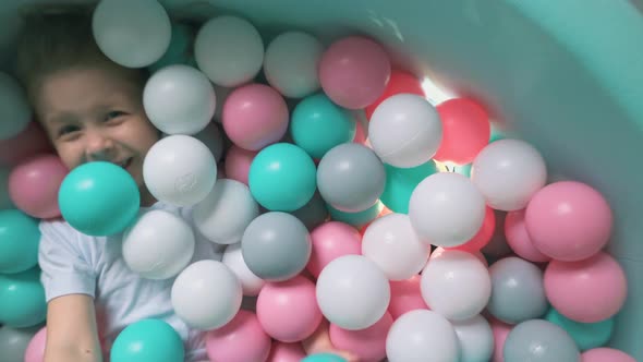 Child Flounders in Round Dry Pool alt