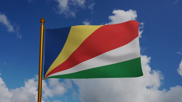 National flag of Seychelles waving with flagpole and blue sky timelapse alt