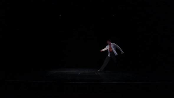 Male Ballroom Dancer Performs Solo Latin American Dance in White Shirtblack Trousers