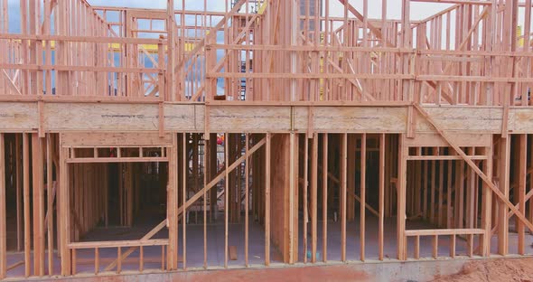 Exterior with Wood Framing Beam of New House Under Construction Beam Wood alt