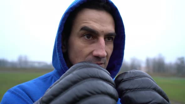 Man boxer wearing boxing gloves