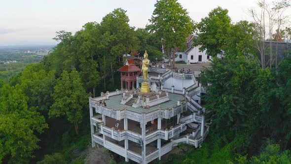 Aerial view of golden buddha pagoda stupa. Wat Phrathat Khao Noi Temple Park, Nan alt