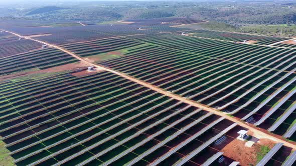 Aerial View of Giant Portuguese Fields with Solar Photovoltaic Batteries to Create Clean Ecological