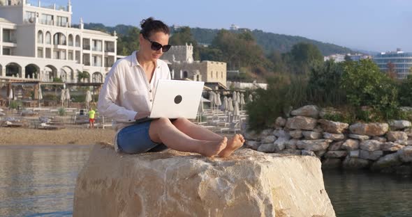 Businesswoman on sea bay. alt