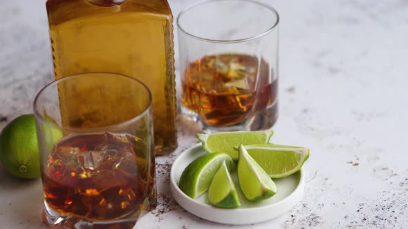 Whiskey Sour Drink with Lemon in Glass on Stone Rustical Background alt