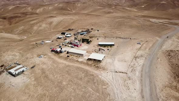 Aerial view of a campsite of the Rashaida people in the desert alt