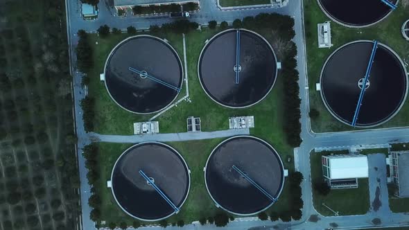 Sewage treatment plant in green fields. Grey water recycling. alt