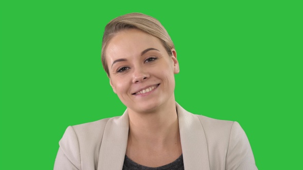 Happy young woman in formal clothes looking at camera with alt