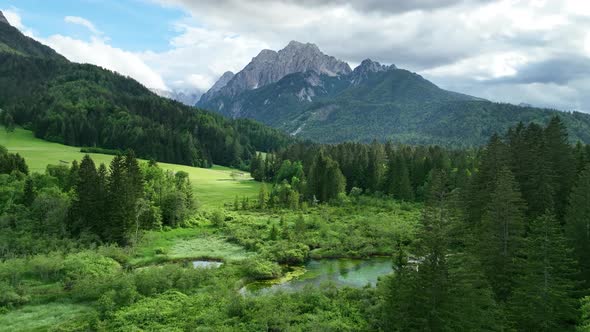Beautiful lake and mountains in a hilly countryside alt